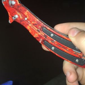Flame wrapped butterfly knife